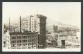 Postcard: [Anson Mills Building and San Jacinto Plaza]
