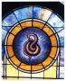 Photograph: [Stained Glass Window Pane of a Serpent]
