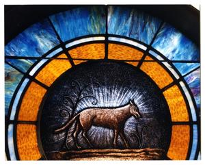 Primary view of object titled '[Stained Glass Window Pane of a Wolf]'.