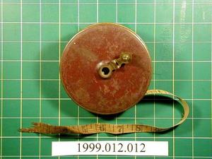 Primary view of object titled '[Cylinder tape measure]'.