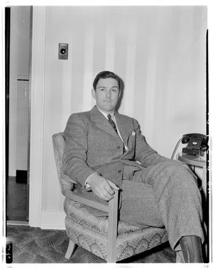 [John Connally seated in chair]