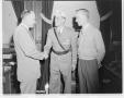 Photograph: [Governor Stevenson with man in uniform]