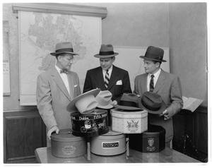 [Mayor Charles McAden and others holding hats on Felt Hat Day]