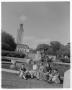 Primary view of [Students sitting in front of U.T. water fountain]