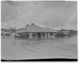 Photograph: [Photograph of the Night Hawk Restaurant During a Flood]