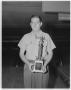 Thumbnail image of item number 1 in: 'Unidentified Man With Trophy'.