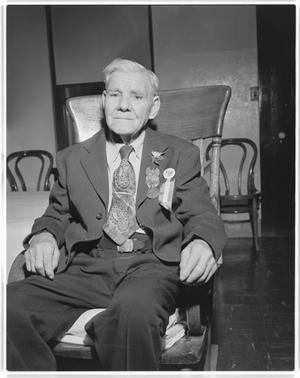 Primary view of object titled '[Thomas Evans Riddle, seated with medals]'.