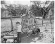 Photograph: [Children playing outside at a nursery]