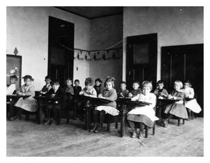 Primary view of object titled '[Young School Children Sitting at Their Desk]'.