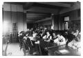Photograph: [West Texas State Normal College students in the library]