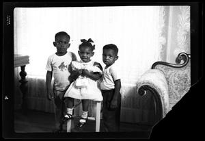 [Photograph of Three Young Children]