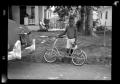 Primary view of [Photograph of Larry Wydermyer with a Bicycle]