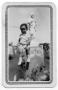 Photograph: [Photograph of Toddler on Gravestone]