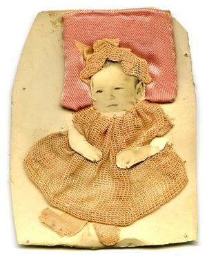 [Photograph of a Baby Wearing an Embroidered Dress]