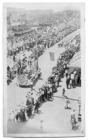 [View of Cannon Float in a Parade]
