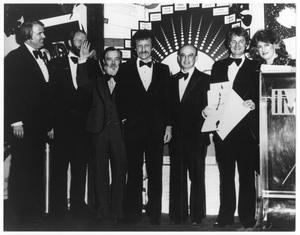 [Photograph of Bill Hall In a Row of Formally Dressed People]