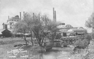 [Sugar mill in Sugar Land, canal in front]