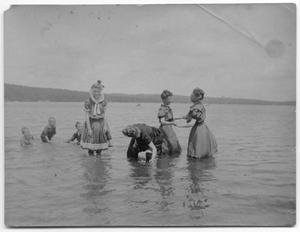 [Photograph of People Playing in Water]