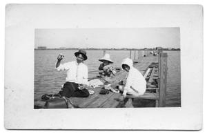 Primary view of object titled '[Two Women and Man Fishing]'.