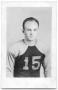 Photograph: [Young Man in Football Uniform]