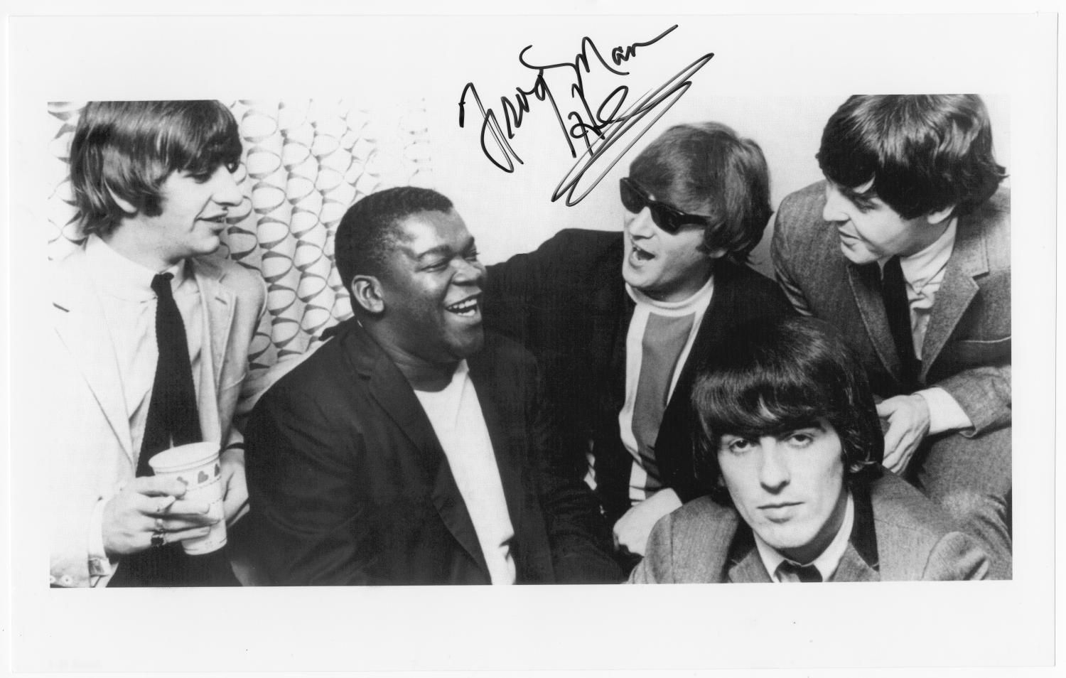 [Photograph of Clarence "Frogman" Henry with the Beatles]
                                                
                                                    [Sequence #]: 1 of 2
                                                