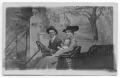 Photograph: [Man and Woman in Car]