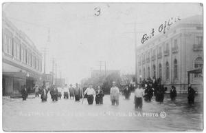Primary view of object titled '[Men Standing in Flooded Street]'.
