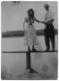 Primary view of [Couple Standing on Fence]
