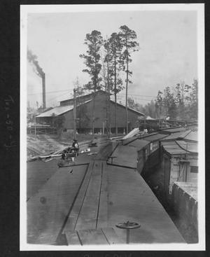 Primary view of object titled '[Southern Pine Lumber Company Planing Mill and Loading Dock]'.