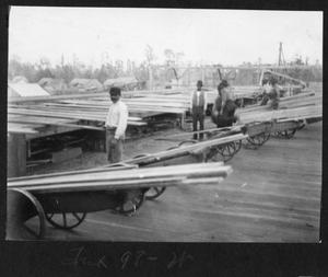 [Southern Pine Lumber Company Workers with Lumber Carts]