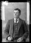 Photograph: [Young man in three piece suit]