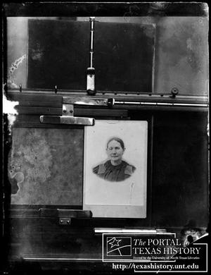 [Photograph of a photograph of a woman]
