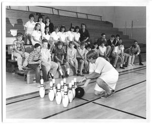 [Photograph of Students Learning How to Bowl at a School Gym]