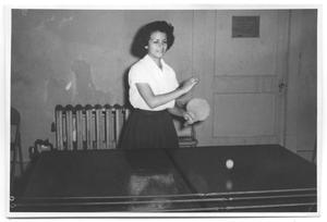 [Photograph of a Woman Playing Ping Pong]