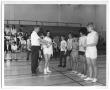 Thumbnail image of item number 1 in: '[Photograph of Students Learning How to Hold a Badminton Racket]'.