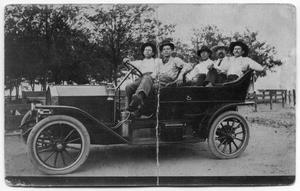 Primary view of object titled '[Group of men in new car]'.