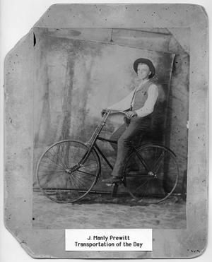 Primary view of object titled '[J. Manly Prewitt on bicycle]'.