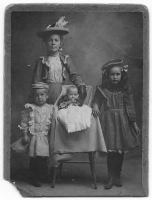 [Portrait of woman and children]