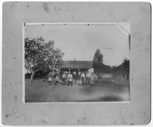 Primary view of object titled '[Family in front of house]'.