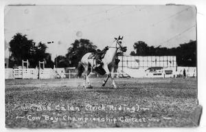 Primary view of object titled 'Bob Calen trick riding - Cowboy Championship Contest, c. 1920'.