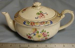 [John Maddock and Sons Royal Vitreous tea pot with gold rim]