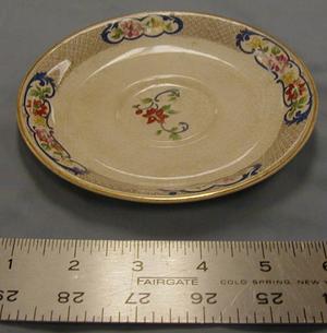 [John Maddock and Sons Royal Vitreous small saucer with gold molding]