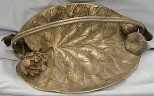 silver serving tray with handle and leaf design