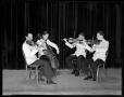 Photograph: [Denton Teacher's College string quartet plays on stage]