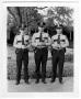 Photograph: Three City of Denton Police Officers Standing in Front of City Hall