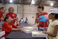 Primary view of [School supplies are handed out at a back to school fair in Dallas, Texas]