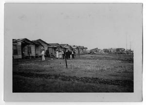 Primary view of object titled '[Photograph of a "Shantytown" Outside of Port Arthur, Texas]'.