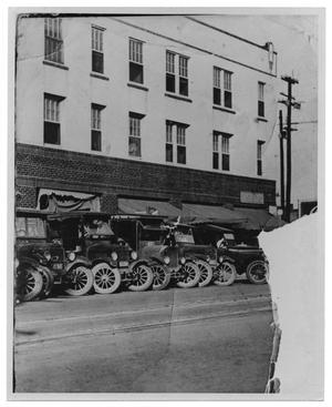 Primary view of object titled '[Delivery trucks in front of Crystal Cafe]'.