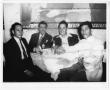 Photograph: [Men at restaurant in Monterrey]