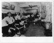 Photograph: [Barbers posing inside La Preferencia Barber Shop]
